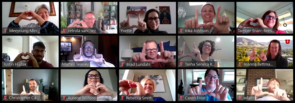 A photo of 15 faculty and staff in a Zoom meeting format